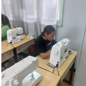 Filomena College Mavo Student Sewing